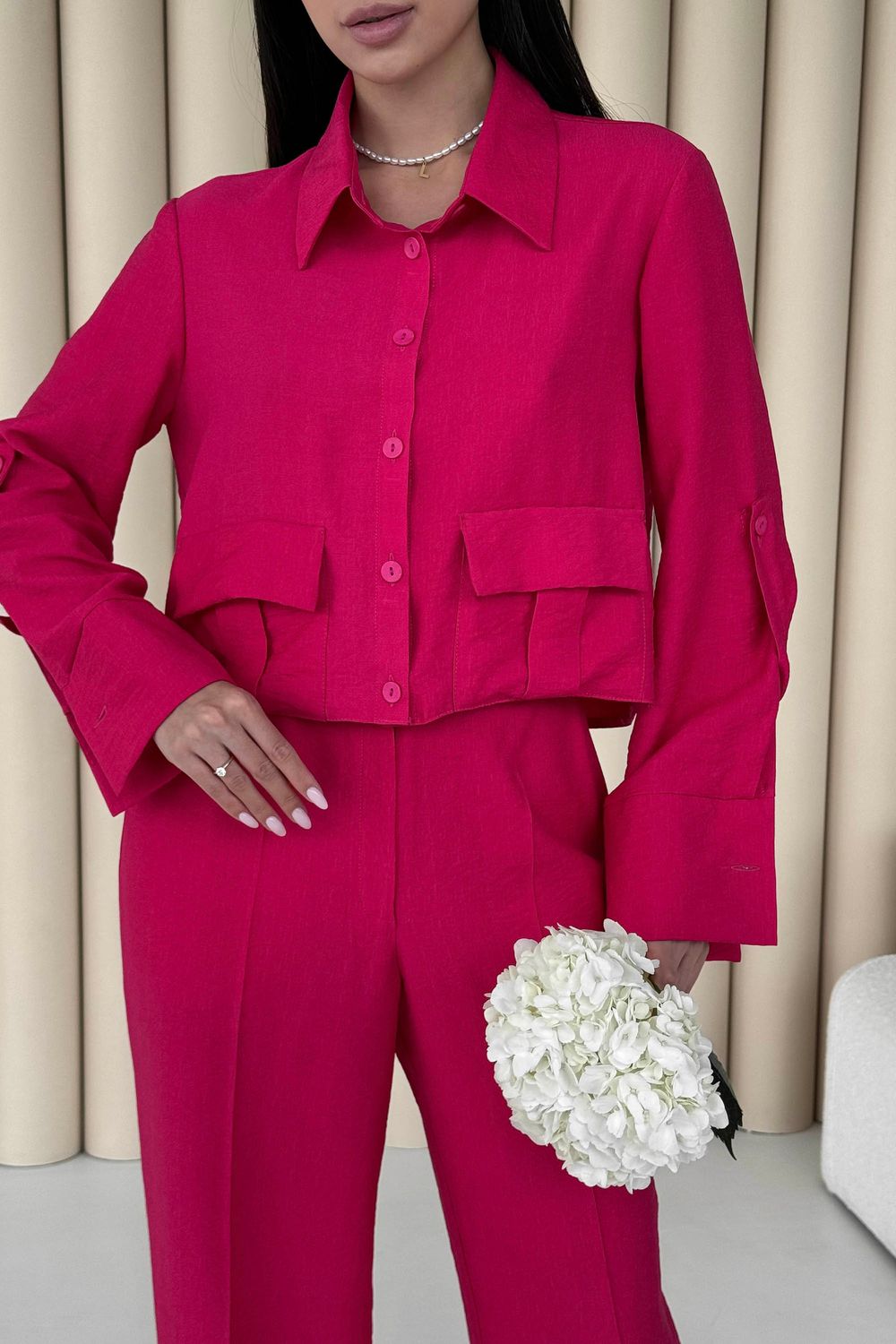 Стильний літній брючний костюм з льону рожевого кольору - фото