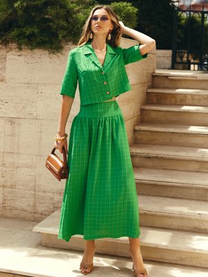 Модний літній костюм зеленого кольору - фото