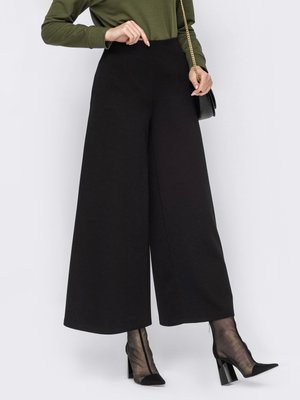 Трикотажные брюки-палаццо черного цвета - фото