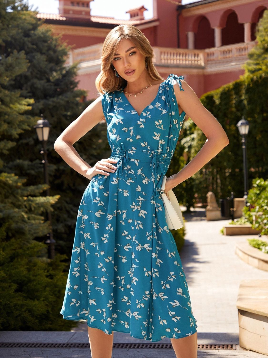 Літнє плаття з квітковим принтом бірюзового кольору - фото