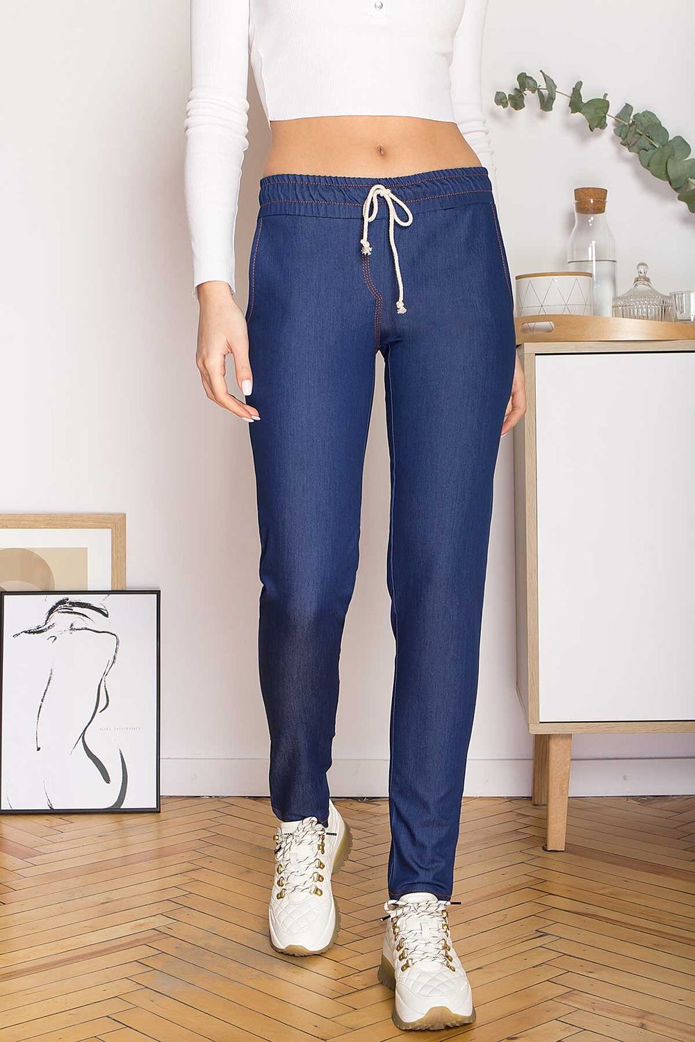 Жіночі джинсові штани на гумці - фото