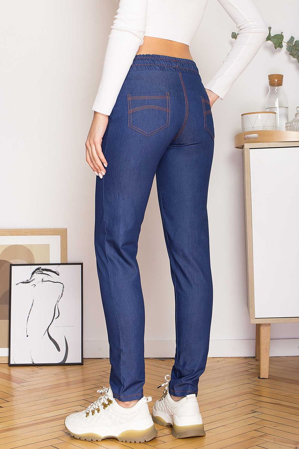Жіночі джинсові штани на гумці - фото