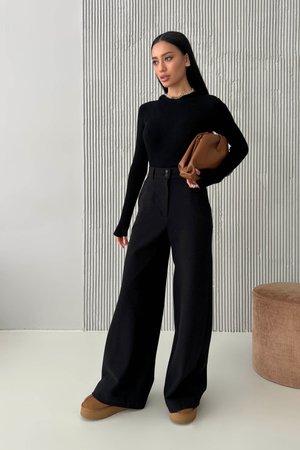 Теплі штани-палаццо чорного кольору - фото