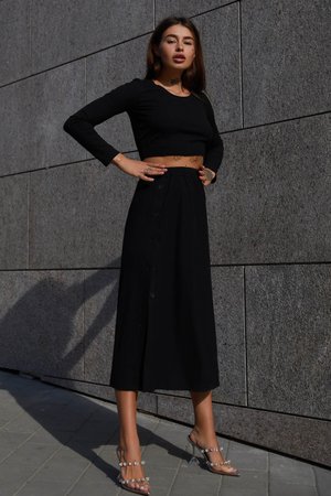 Жіночий трикотажний костюм зі спідницею чорний - фото