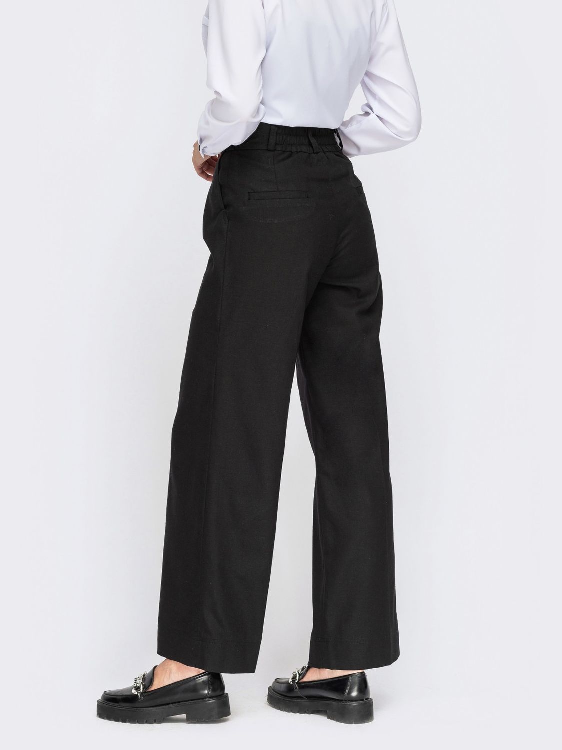 Черные женские брюки клеш - фото