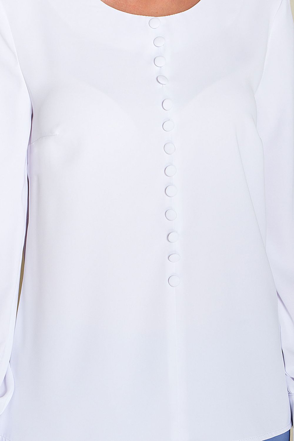 Вільна біла блузка з декоративними гудзиками - фото
