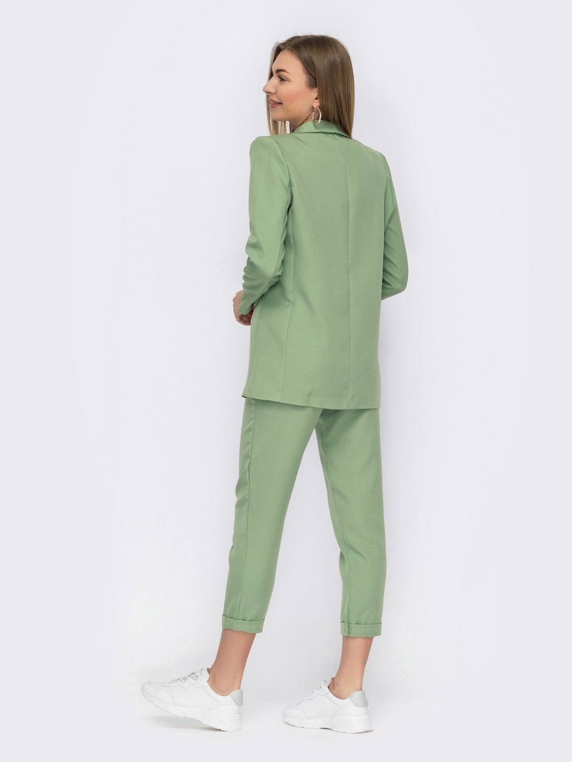 Стильний діловий костюм-трійка із брюками зелений - фото
