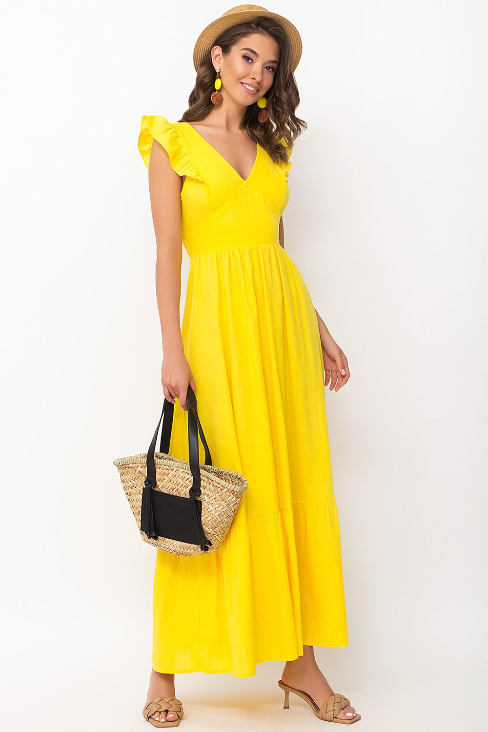 Довгий жіночий сарафан лляного жовтого кольору - фото