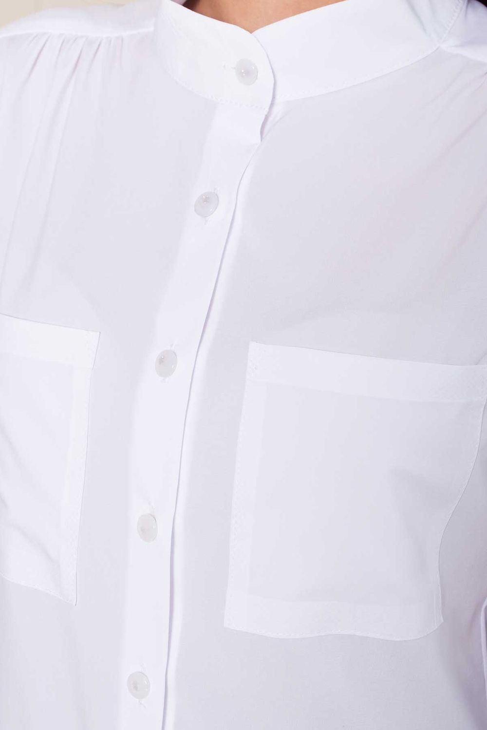 Біла шифонова блузка в діловому стилі - фото