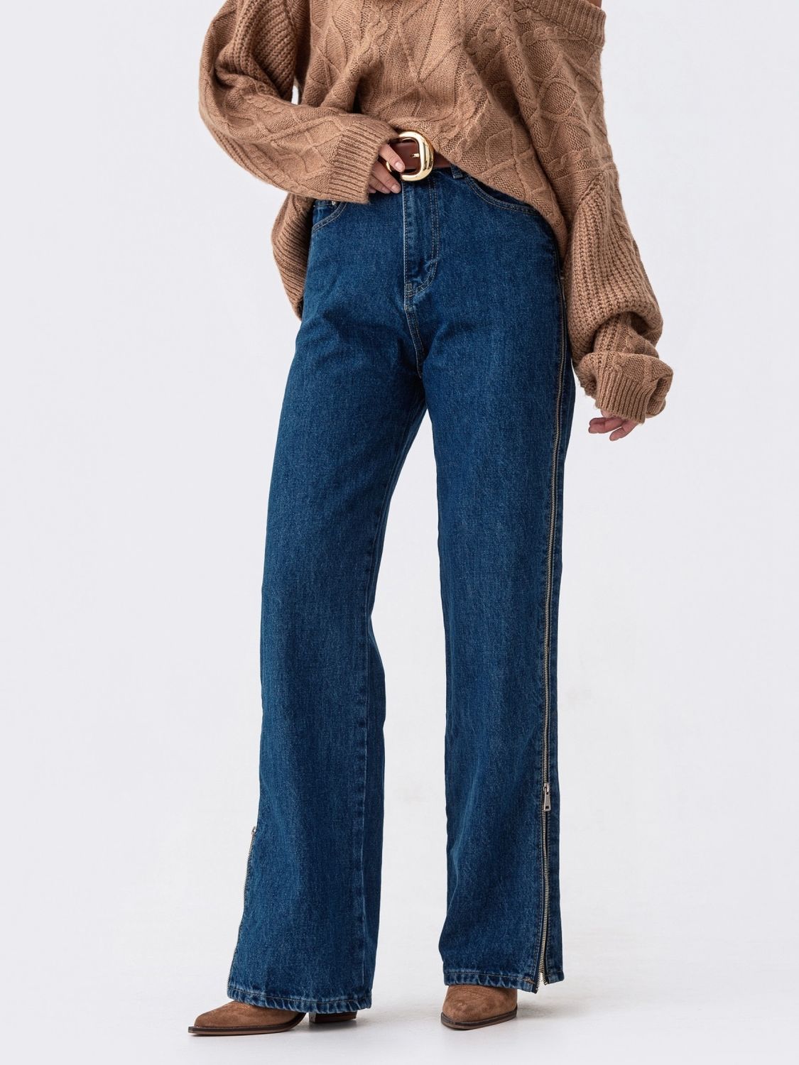 Стильні жіночі джинси з високою посадкою - фото